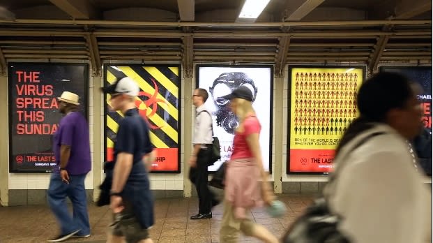 Mobile app replaces subway ads with art