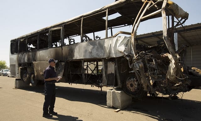 Most Calif. bus crash victims died of smoke inhalation, coroner says