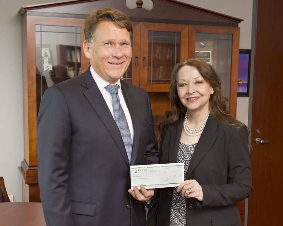 Fleet Manager of Year Davis Presents Scholarship Check
