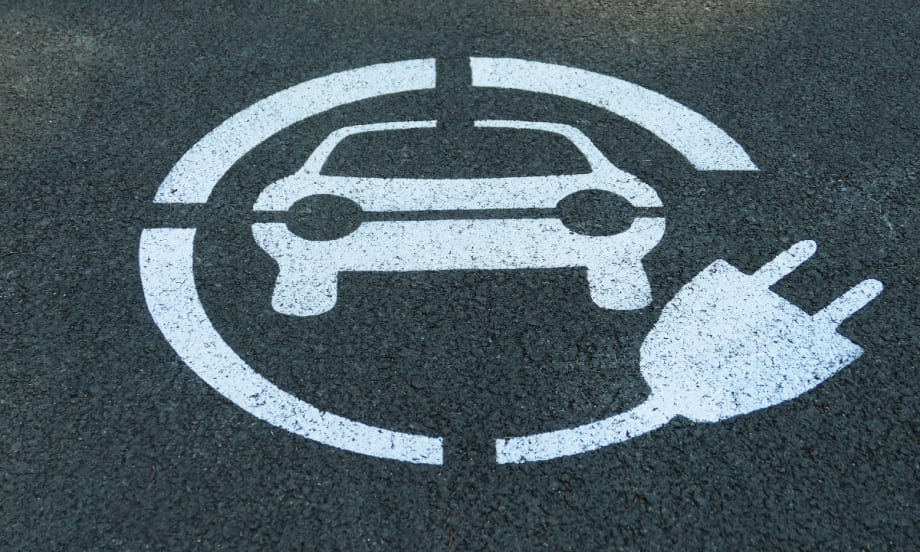 pavement with car and charger wrapped around it painted on