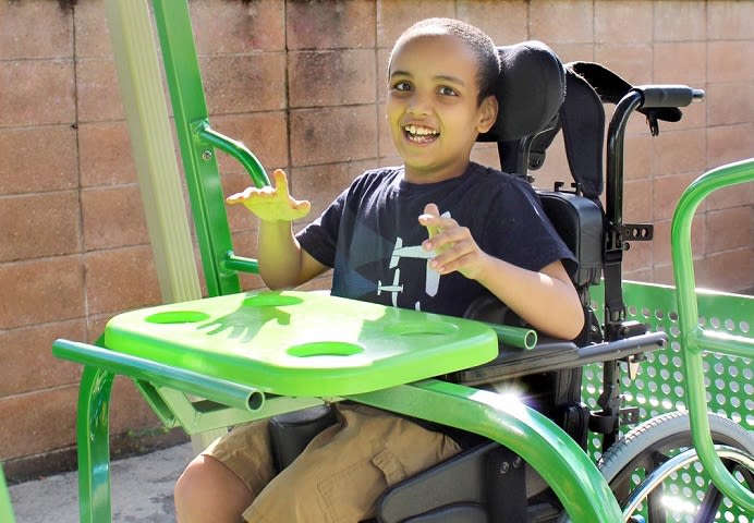 Q’Straint Rebuilds Inclusion Swingset for Special-Needs School