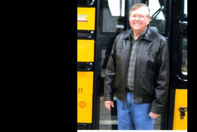 Iowa district purchases school bus company