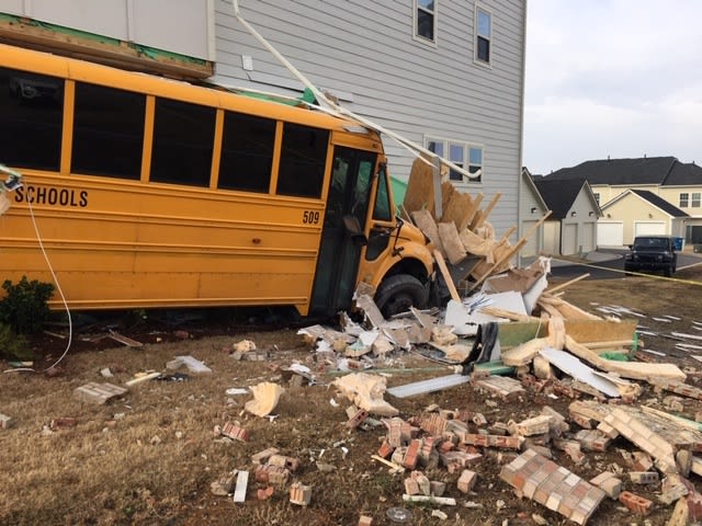 School Bus Driver Cited After Crashing into Apartment Building