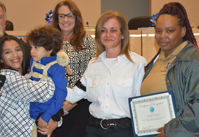 Special-Needs School Bus Driver, Aide Honored for Helping Save Student from Passing Car