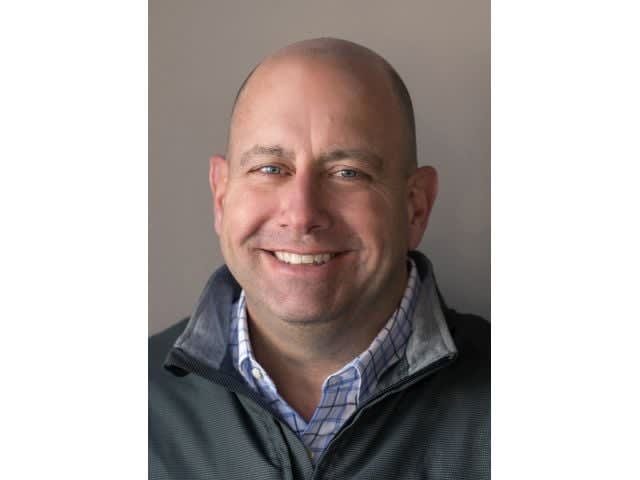 New Collins exec shifts from red to yellow