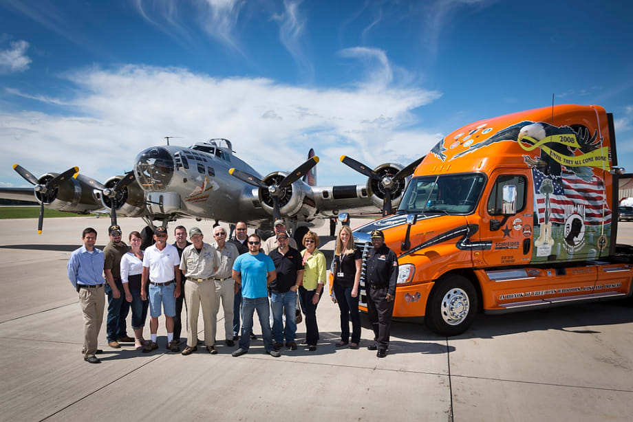 Schneider National Representatives Take Trip on Historic Military Plane