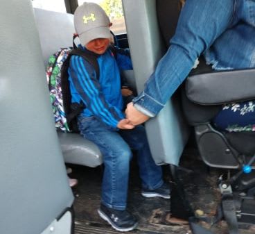Bus Driver Comforts Student on First Day of School
