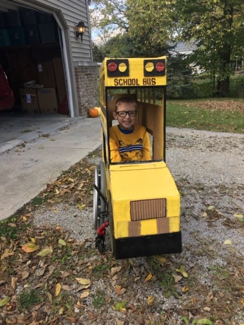 Grandfather Builds School Bus Costume for Grandson in Wheelchair