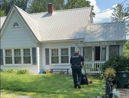 NC Officer Mows Lawn for Elderly Citizen