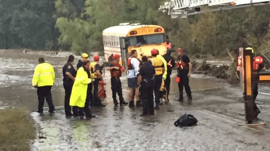 Special-needs students rescued from flooded school bus