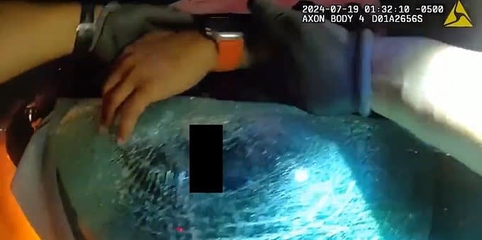 Video: Texas Officer Pulls Man from Burning Tesla