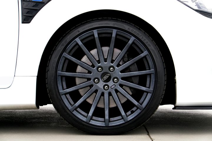 Photo of tire on white car
