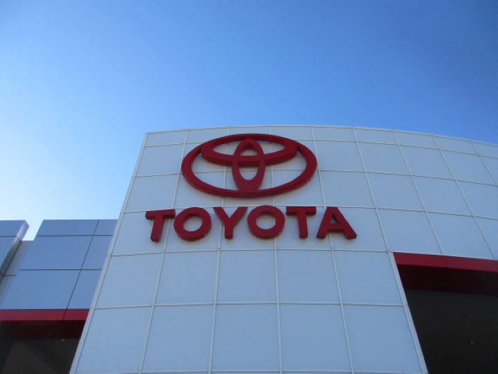 Photo of dealership sign with Toyota logo