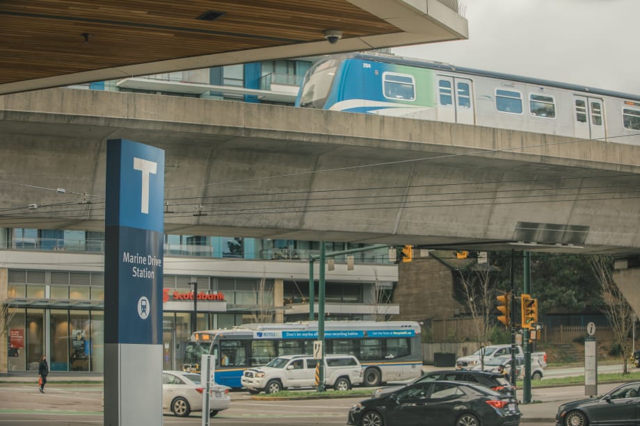 A TransLink bus and rail line in operation.