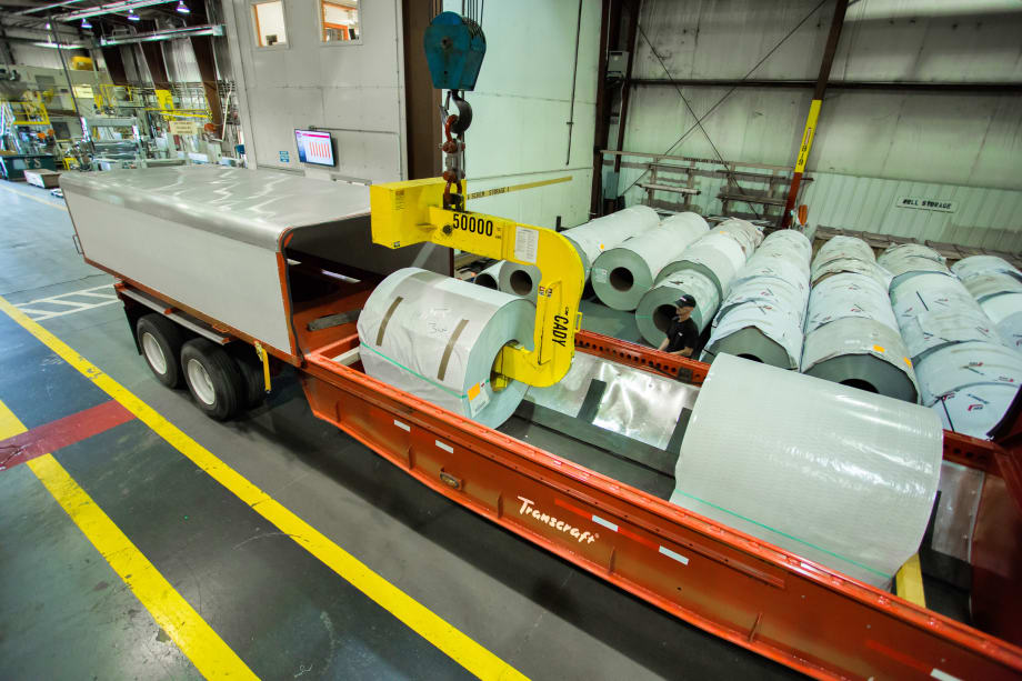 Metal Coils Snuggle Safely into Cradles on This Specialized Trailer