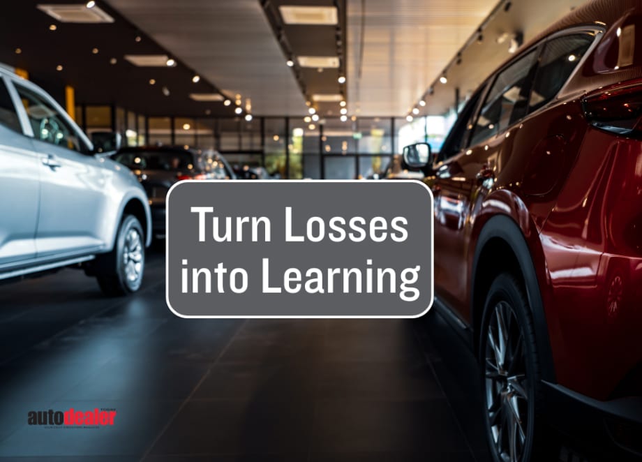 inside car dealership, text box Turn Losses into Learning, Auto Dealer Today
