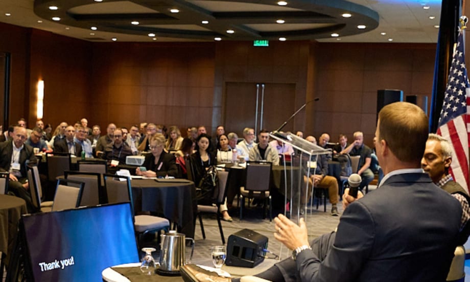 conference attendees watching a speaker