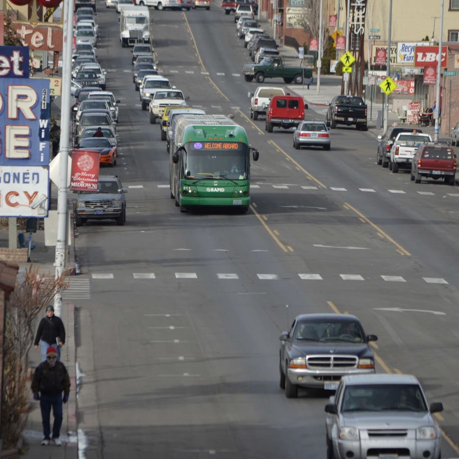 An RTC of Washoe County bus driving down Virginia Street.