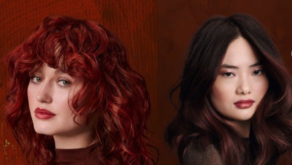 A red headed woman and a brunette woman