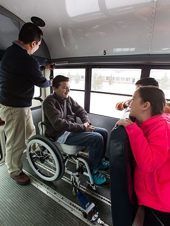 Wheelchair retractor