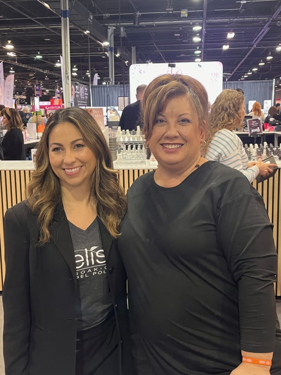 Two women smiling for a photo.
