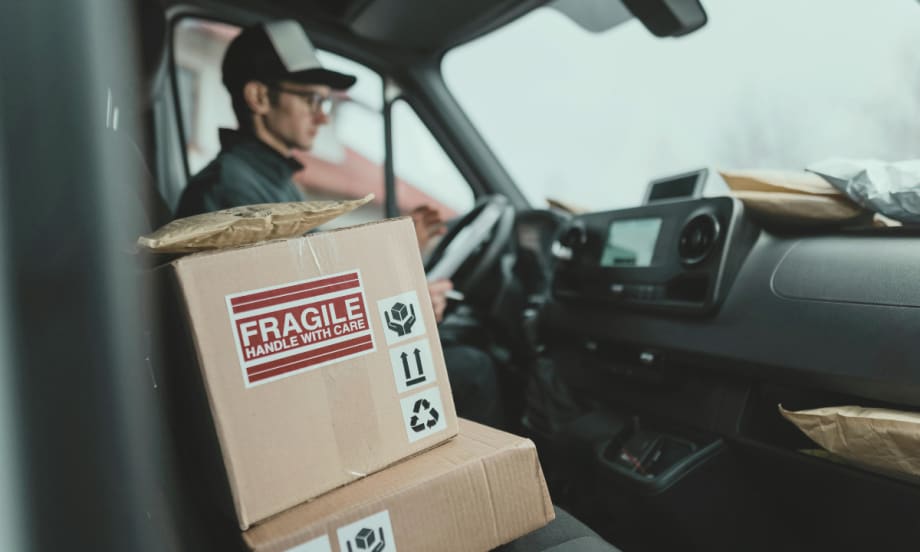 Packages in a delivery vehicle seat.