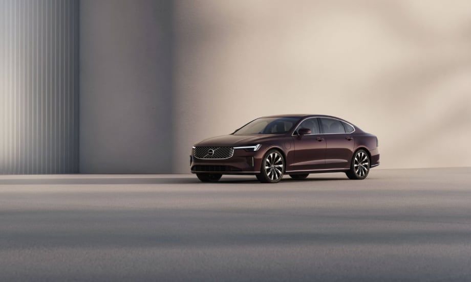 A maroon Volvo S90.