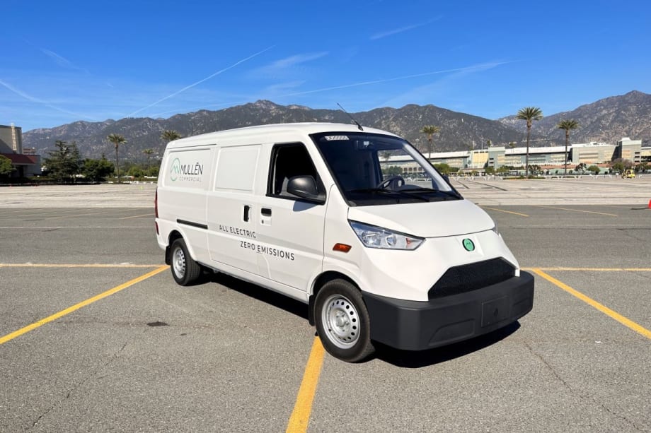 White Mullen ONE van in a parking lot.