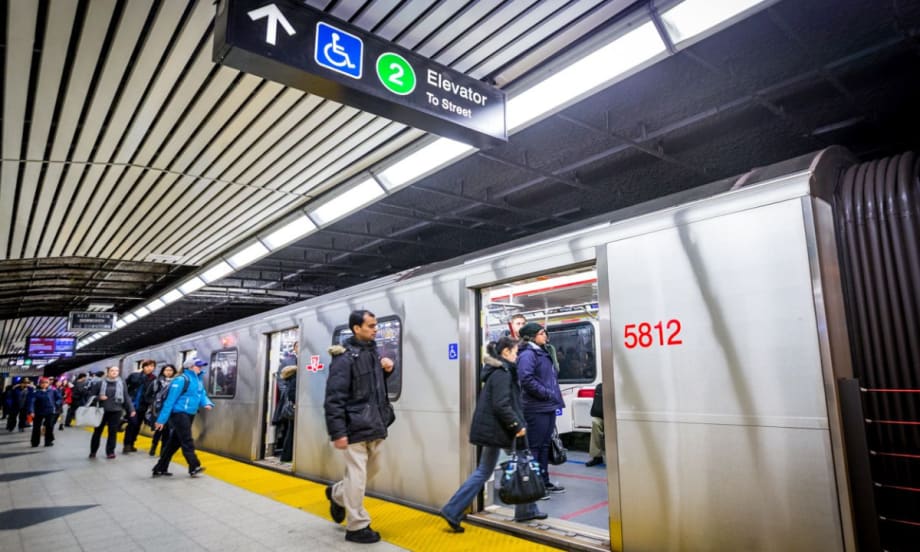 Riders boarding at a Toronto rail station.