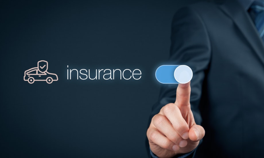 finger swiping car insurance button on