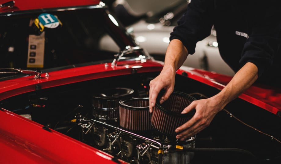 auto technician working on car