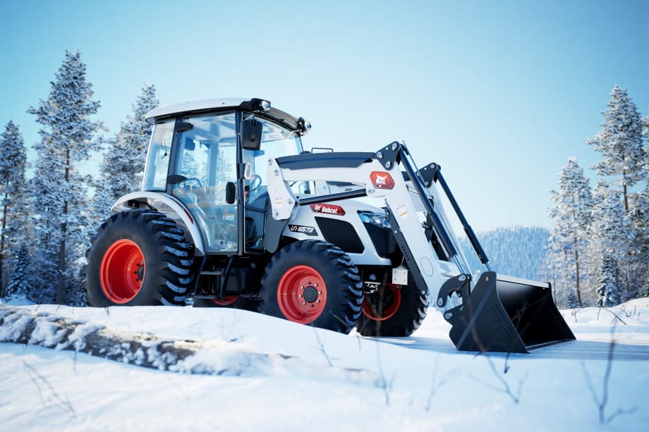 A white Bobcat UT6573 is shown sitting in a snowy setting.