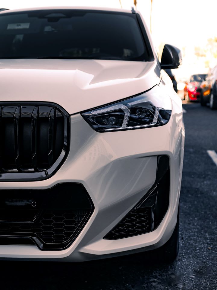 Trio Charged in Used-Car Auction Scheme