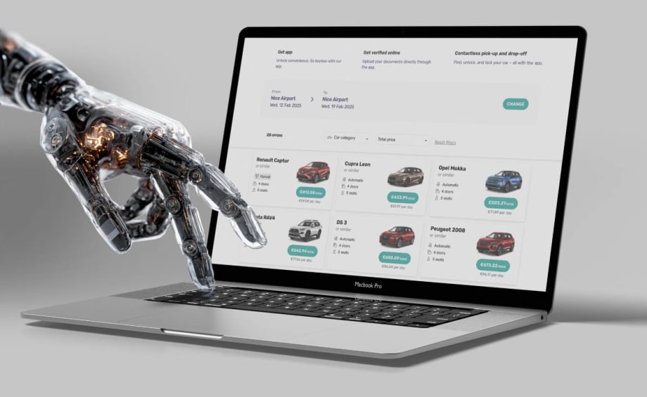 A robotic hand searching for a rental car on a laptop computer.