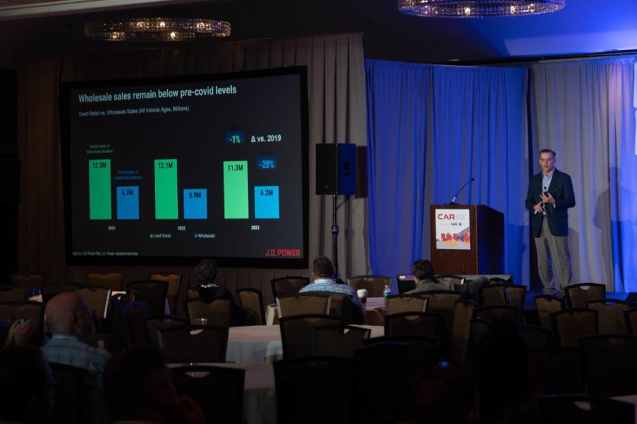 David Sargent of JD Power speaks on stage at CAR Conference.
