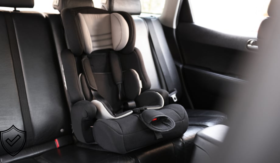 car seat in back seat of car