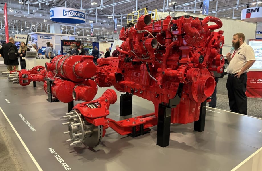 Red Cummins X15 powertrain display at TMC
