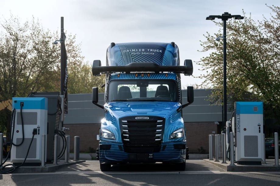 2024 Freightliner eCascadia electric-autonomous truck at charging station.