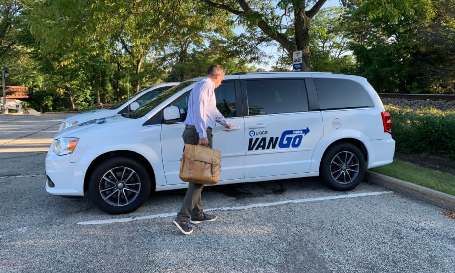 Driver enters Pace VanGo vehicle.