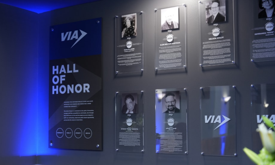 VIA's Hall of Honor wall with all inductees pictured.