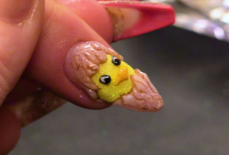 Egg & Chick Easter Nail Design on an Almond Nail