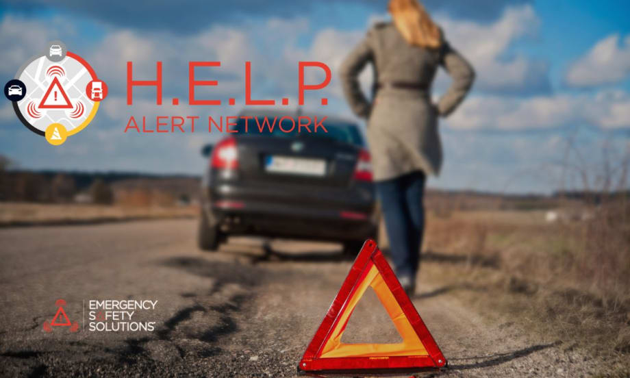 A woman walking toward her disabled car on the side of the road with a roadside alert triangle on the ground.