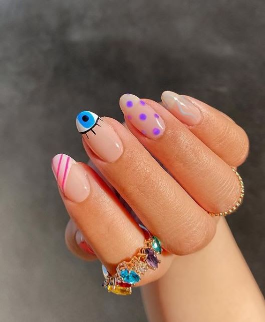 TRENDING: Evil Eye Nail Art for Protection at Your Fingertips