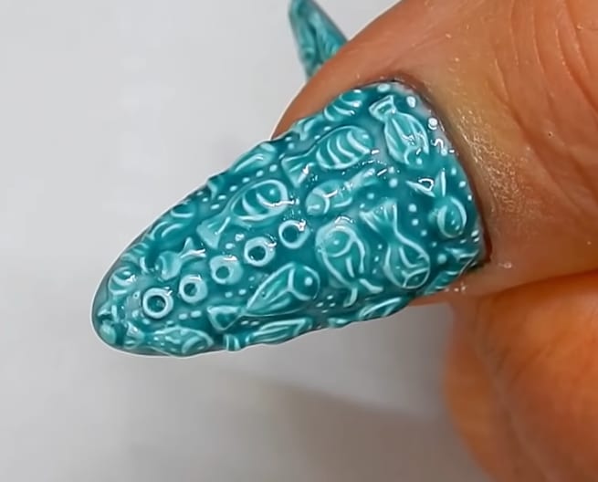 Glazed Pottery Nail Art With Fish Design