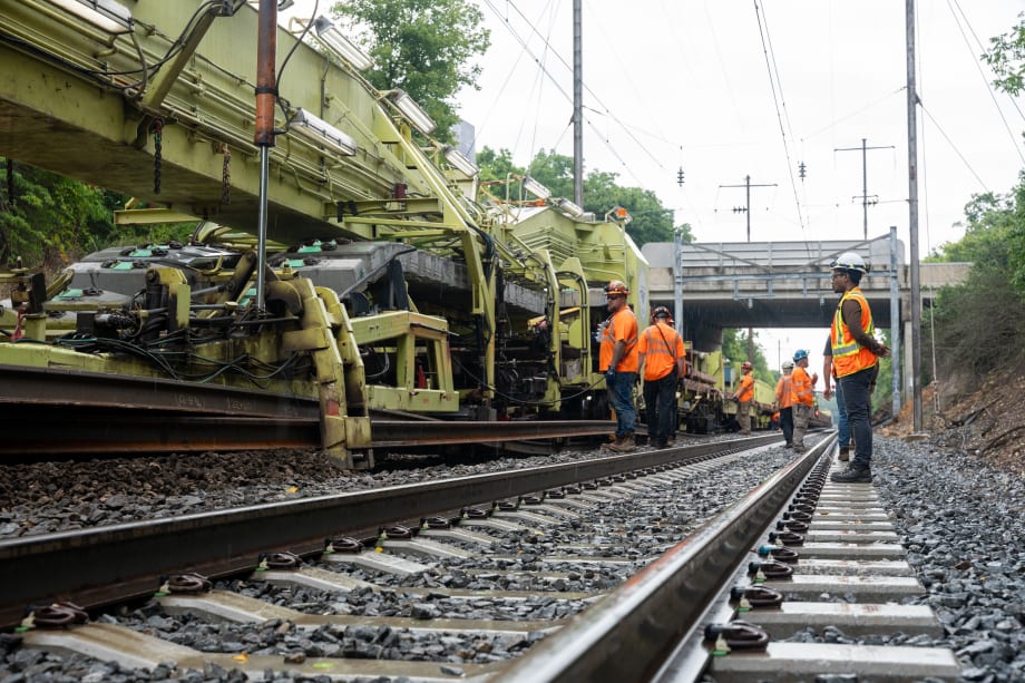 Workers replacing tracks along Amtrak's Harrisburg line.