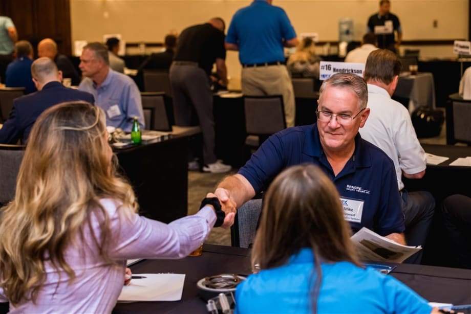 Fleet manager shaking hands with supplier representative