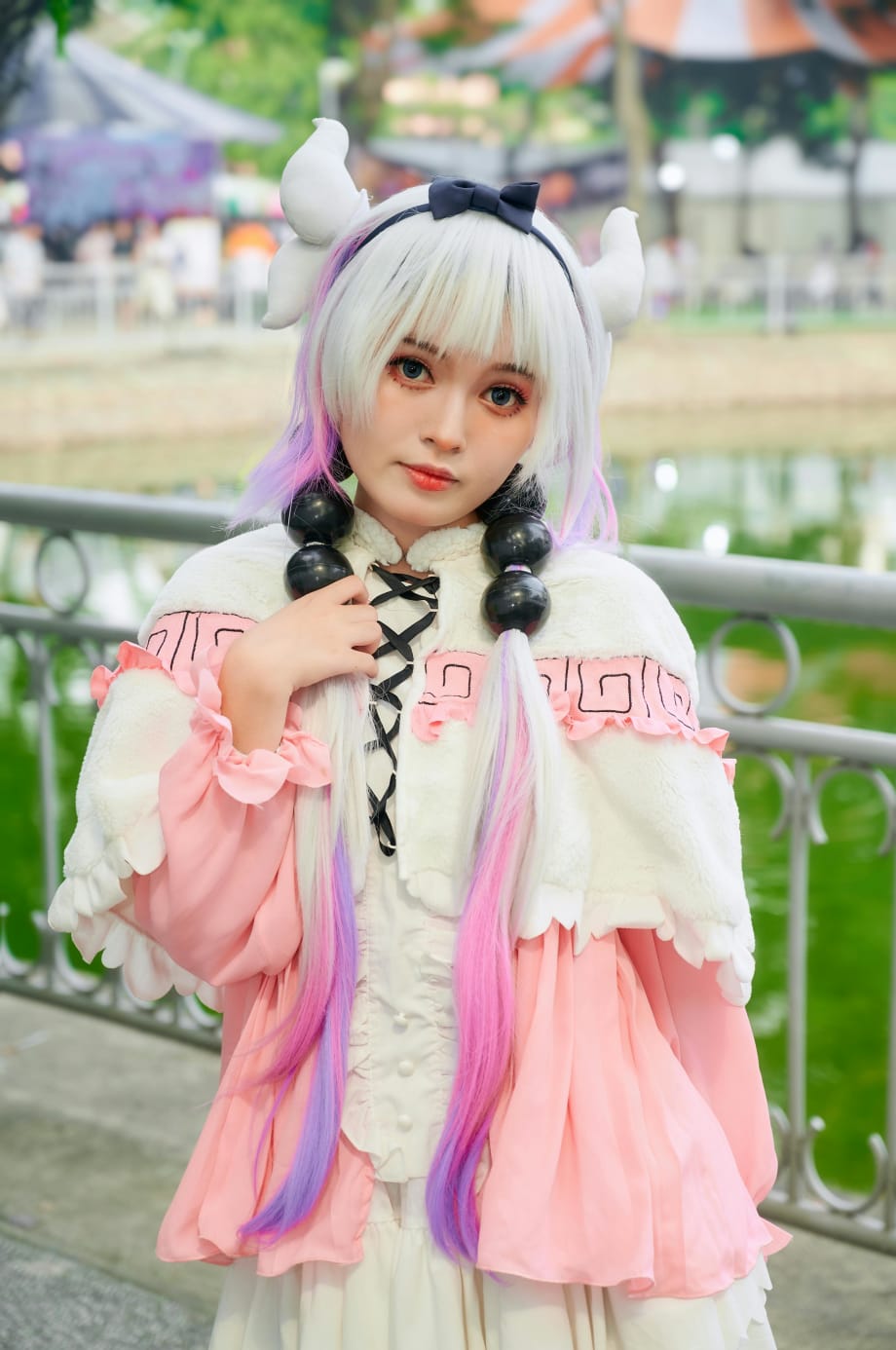 A cosplay character in a hime haircut.