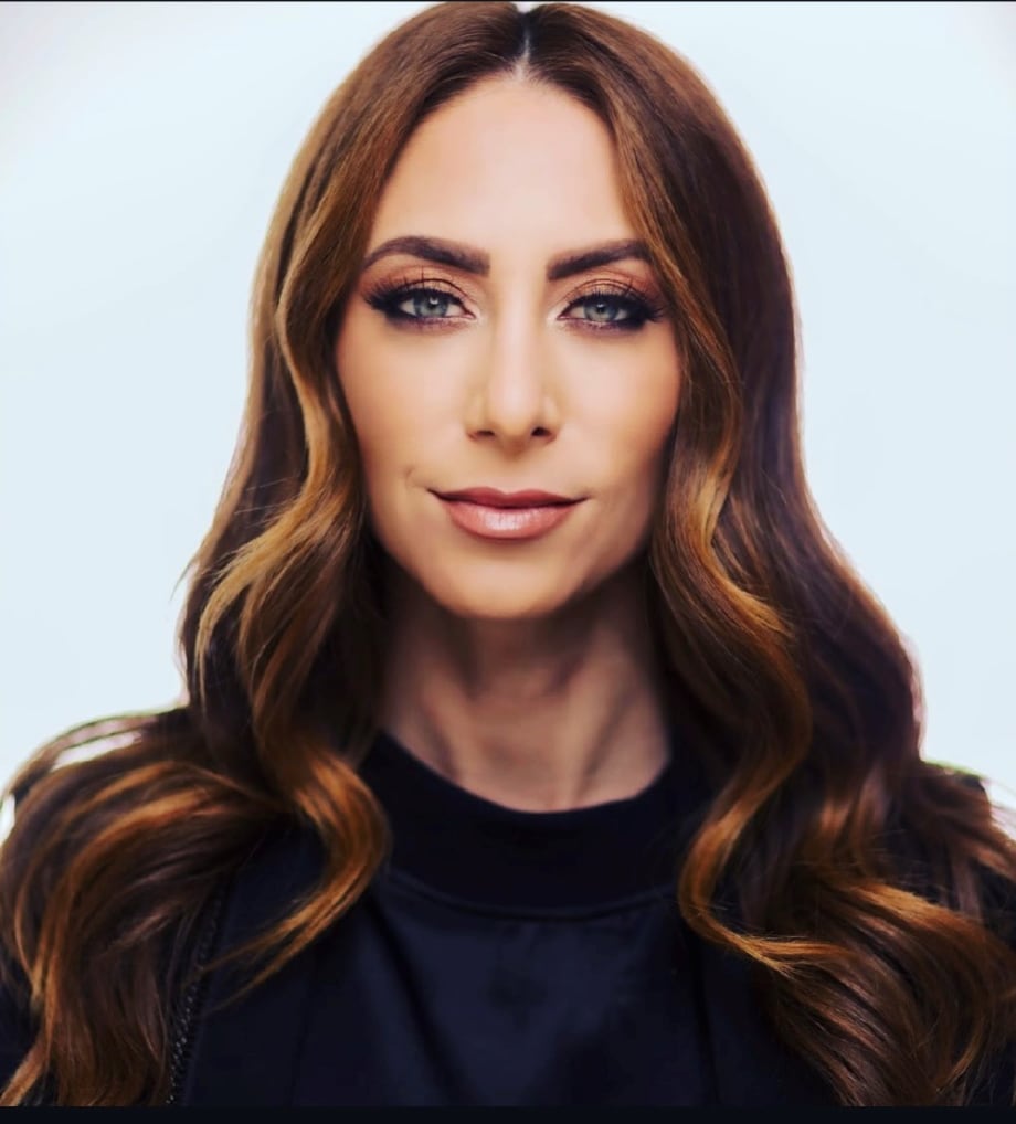 A woman with long brunette hair