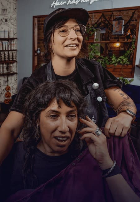 Hair Has No Gender is the nonprofit founded by Chicago stylist and salon owner, Jamie DiGrazia, shown here with a client.