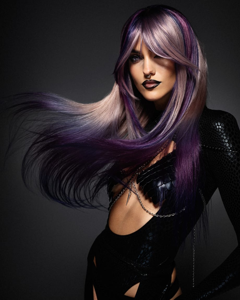 A woman with purple hair.